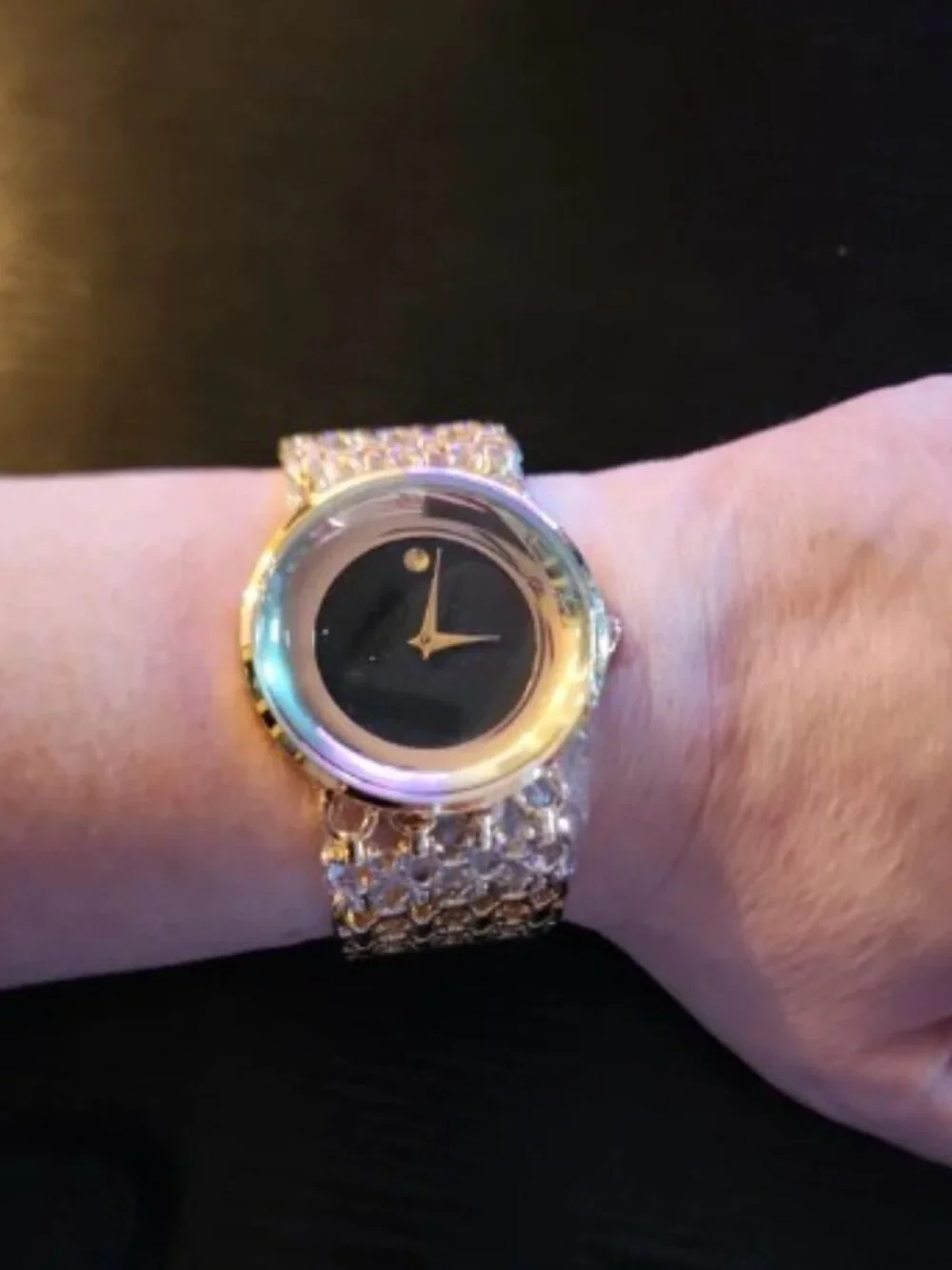 Elegant Gold-Tone Women's Dress Watch with Black Dial